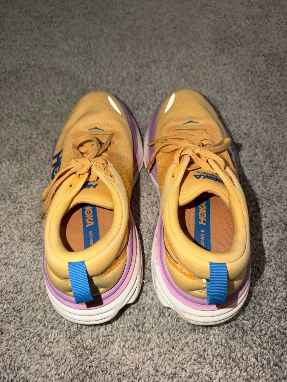 Hoka Women's W BONDI 8 Orange Athletic Running Shoes Purple and Blue Accents